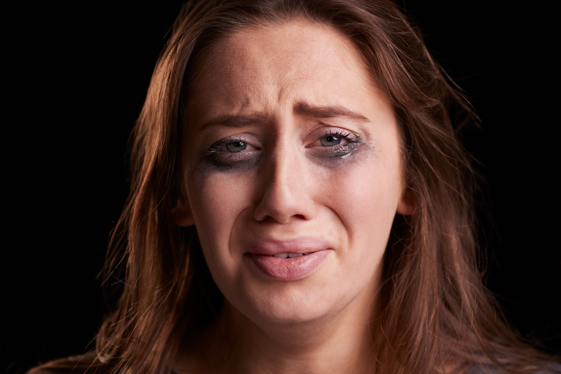 Crying Woman with Smudged Make Up